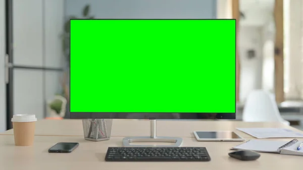 Computer with Green Screen in Office