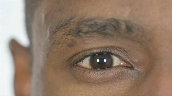 Close Up of One Eye of Young African Man