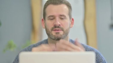 Close Up of Mature Adult Man Doing Video Chat on Laptop
