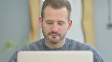 Close Up of Mature Adult Man with Thumbs Up at Work