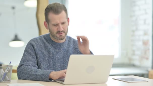 Mature Adult Man Having Neck Pain While Using Laptop — Vídeos de Stock