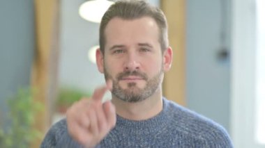 Portrait of Inviting Mature Adult Man