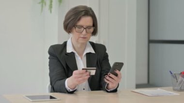 Old Senior Businesswoman Unable to make Online Payment on Laptop