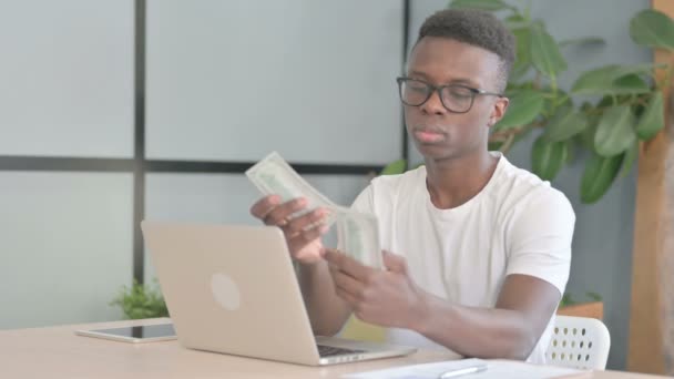 Young African Man Counting Dollar Work — Video Stock