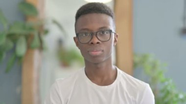 Portrait of Inviting Young African Man in Office