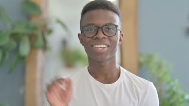 Young African Man Waving Hand Say Hello Video Call — Stock Video