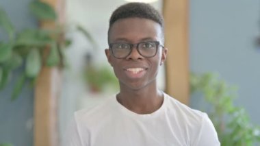 Excited Young African Man Celebrating Success, Feeling Happy