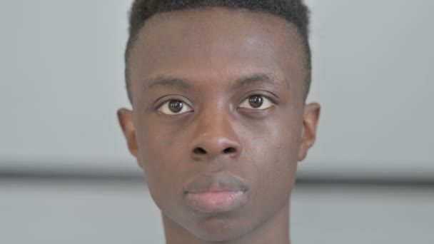 Close Serious Young African Man Face — Stock video