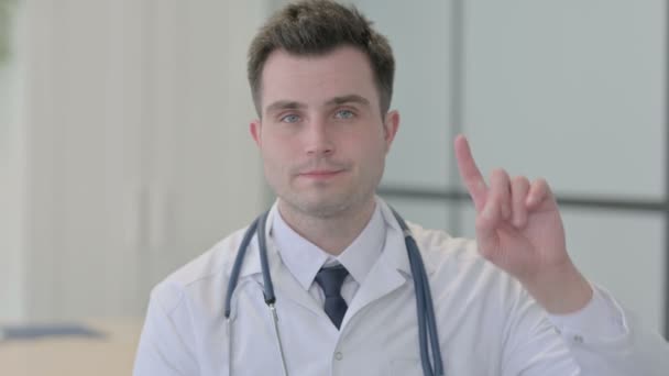 Young Doctor Shaking Head Finger Rejection — Stockvideo