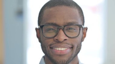 Close Up of Smiling African American Man Face