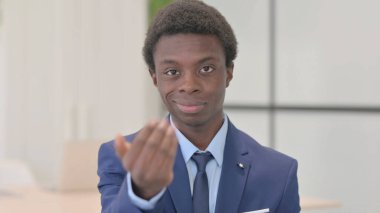 Portrait of Inviting Young African Businessman in Office