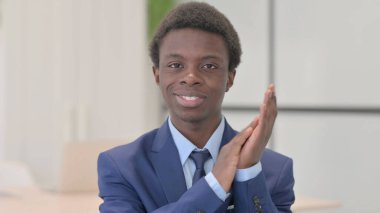 Portrait of Young African Businessman Clapping in Appreciation