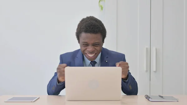 Young African Businessman Celebrating Online Success Laptop —  Fotos de Stock