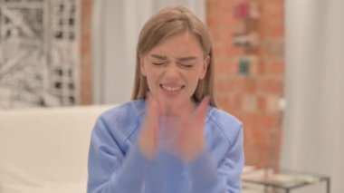 Portrait of Angry Young Woman Screaming in Frustration