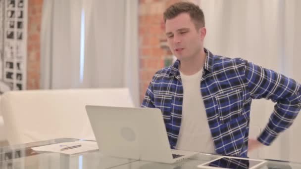 Young Casual Man Back Pain Working Laptop — Stock Video