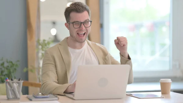 stock image Excited Young Businessman Celebrating Success on Laptop