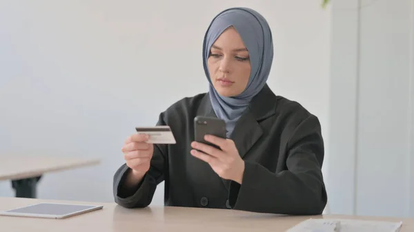 stock image Arab Businesswoman Shopping Online Using Phone and Bank Card