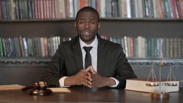 Online Video Chat by African Male Lawyer