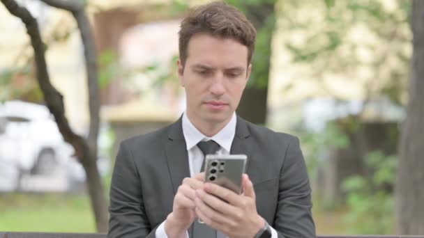Businessman Browsing Internet Smartphone Outdoor — Stock Video