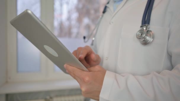 Close Doctor Using Tablet — Stock Video