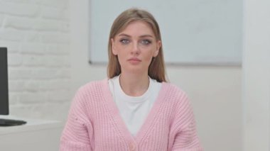 Portrait of Serious Creative Young Woman