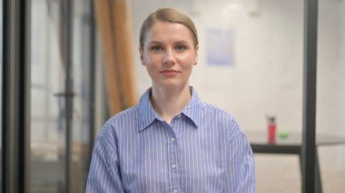 Portrait of Serious Creative Young Woman