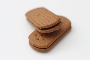 a close up of chocolate biscuit isolated on white background.