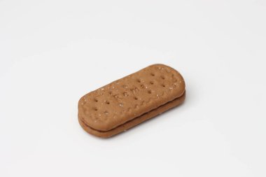 a close up of chocolate biscuit isolated on white background.