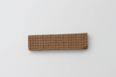 a close up of chocolate wafers isolated on white background.