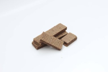 a close up of chocolate wafers isolated on white background.