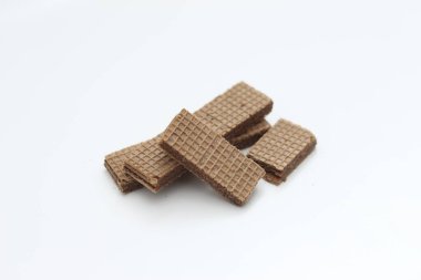 a close up of chocolate wafers isolated on white background.