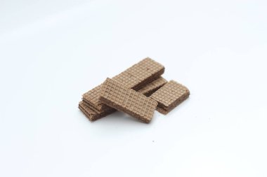 a close up of chocolate wafers isolated on white background.