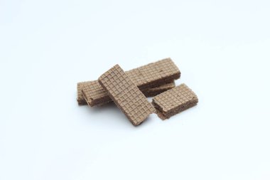 a close up of chocolate wafers isolated on white background.