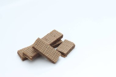 a close up of chocolate wafers isolated on white background.