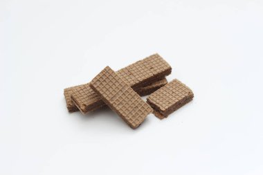 a close up of chocolate wafers isolated on white background.