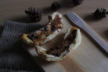 banana milk crispy. made from banana, milk, eggs, and flour with grated cheese and chocolate.