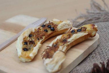 banana milk crispy. made from banana, milk, eggs, and flour with grated cheese and chocolate.