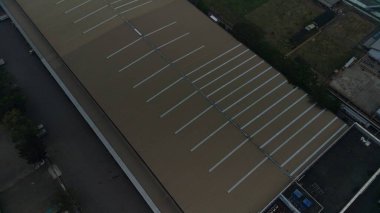Bogor, Indonesia - October 19 2022. aerial view of office building and warehouse distribution center of retail based company at daytime.