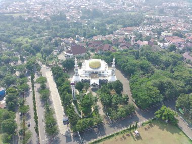 4K footage aerial view of the Baitul Faidzin Grand Mosque at noon in the middle of the central government administration.