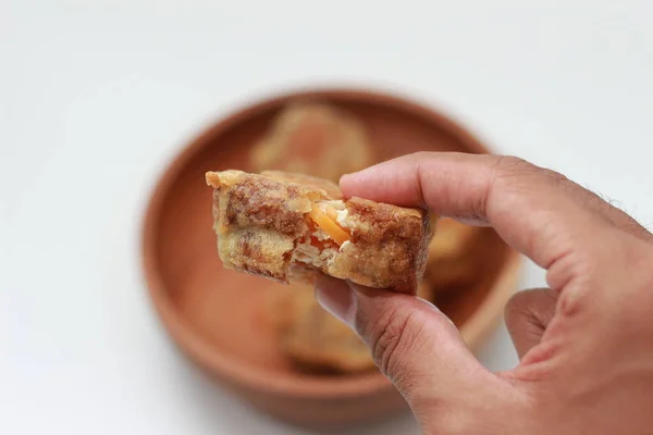Close Fried Stuffed Tofu Gorengan Tahu Isi Holding Hand Isolated — Fotografia de Stock
