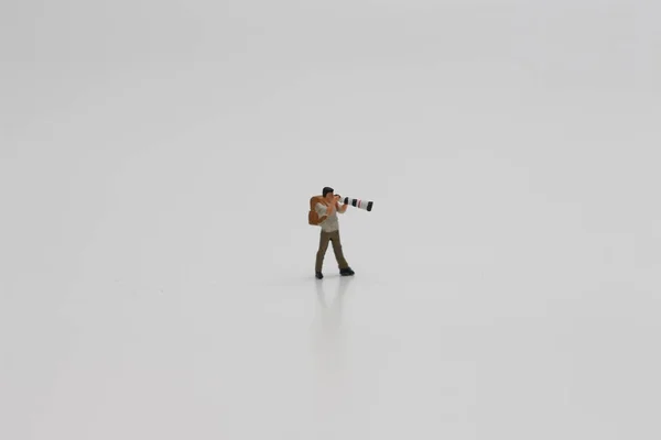Close Miniature Figure Photographer Camera Telephoto Lens Isolated White Background — Stockfoto