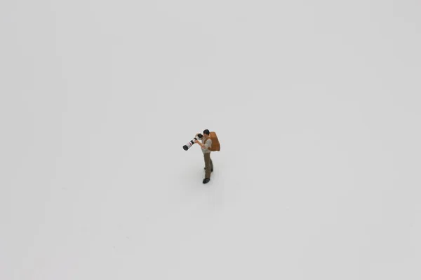 Close Miniature Figure Photographer Camera Telephoto Lens Isolated White Background — Stockfoto