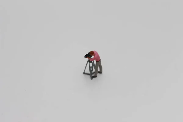 Close Miniature Figure Videographer Isolated White Background Miniature Figure Photo — Stok fotoğraf
