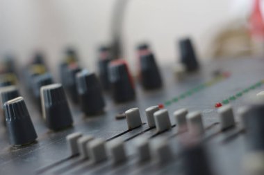 black mixer amplifier detail photo. audio equipment concept photo. Selected focus.