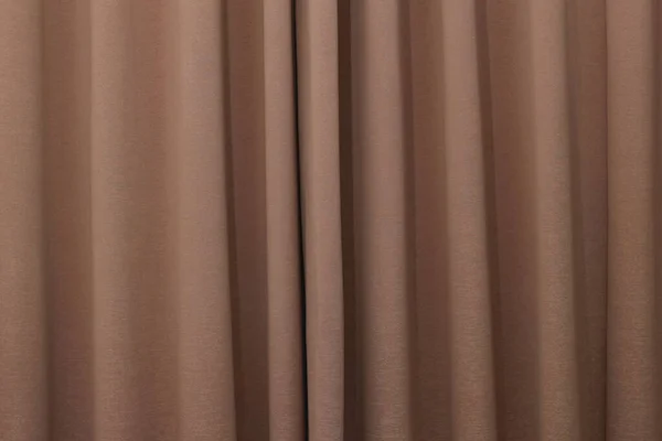 photo of brown workroom curtains. concept photo of furniture needs.