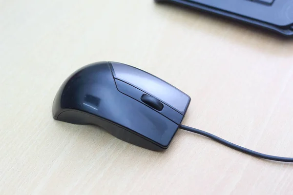 a photo of a black mouse and keyboard to work with. Technology equipment concept photo.