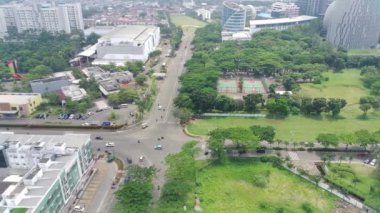 Tangerang, Indonesia - Nov 14 2022. 4K footage aerial view of shophouses and roads in BSD Tangerang, Indonesia.