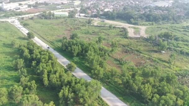 Footage Aerial View Highway Leading Residential Areas Green Fields — 图库视频影像