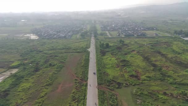 Footage Aerial View Highway Leading Residential Areas Green Fields — Stock Video