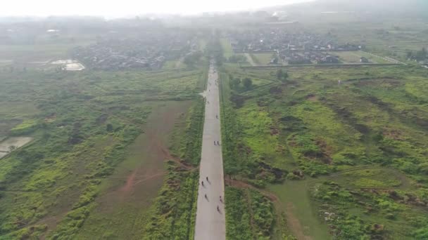 Footage Aerial View Highway Leading Residential Areas Green Fields — Stockvideo